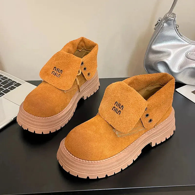Round Toe meets urban edge in these Crump Street lace-up platform boots, crafted for those who never compromise on comfort or cool. With a mid-heel design and sturdy rubber outsole, you’ll walk confidently through every season. The vegan suede upper offers a luxe touch, making these boots equally suited for casual streetwear or bold layering moments.