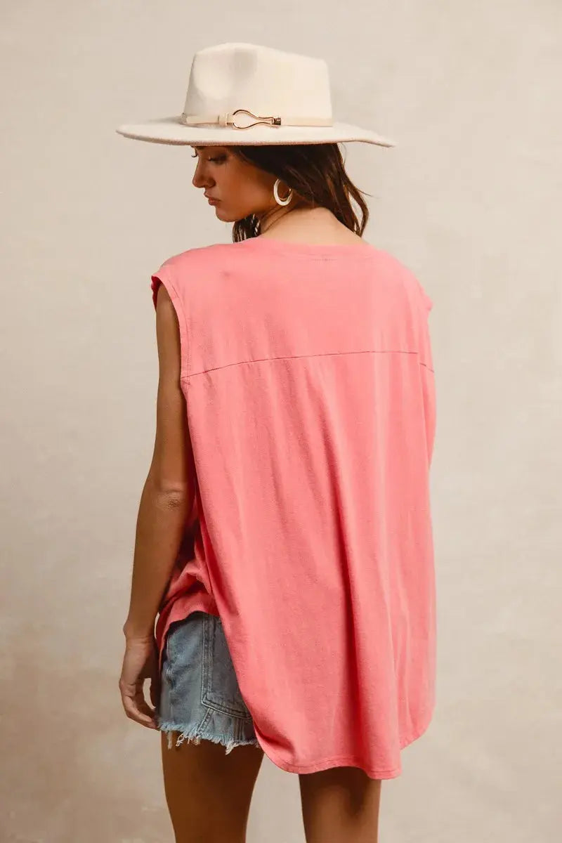 This fashion USA graphic t-shirt features a vibrant coral pink base with bold denim-style USA lettering across the chest. Made from soft cotton blend fabric for ultimate comfort and breathability. The relaxed oversized fit provides a casual, effortless look perfect for everyday wear. The vintage-inspired patriotic design makes it ideal for summer festivals, casual outings, or showing American pride. The round neckline and loose silhouette offer versatile styling options for pairing with jeans, shorts, etc.