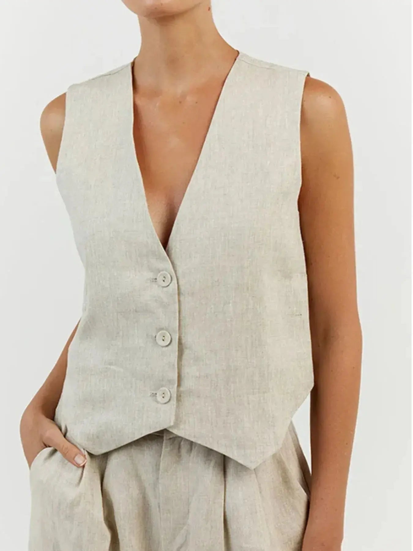 Functional pockets enhance convenience while lending the outfit a utilitarian charm. The top features a modest crop that pairs effortlessly with high-waisted bottoms, while the straight-leg pants offer ease through the hips and thighs. Available in sizes XS to 3XL, the set includes detailed measurements—waist starting at 23.2", bust from 32.3", and full bottom length up to 41.3"—to ensure a personalized fit.