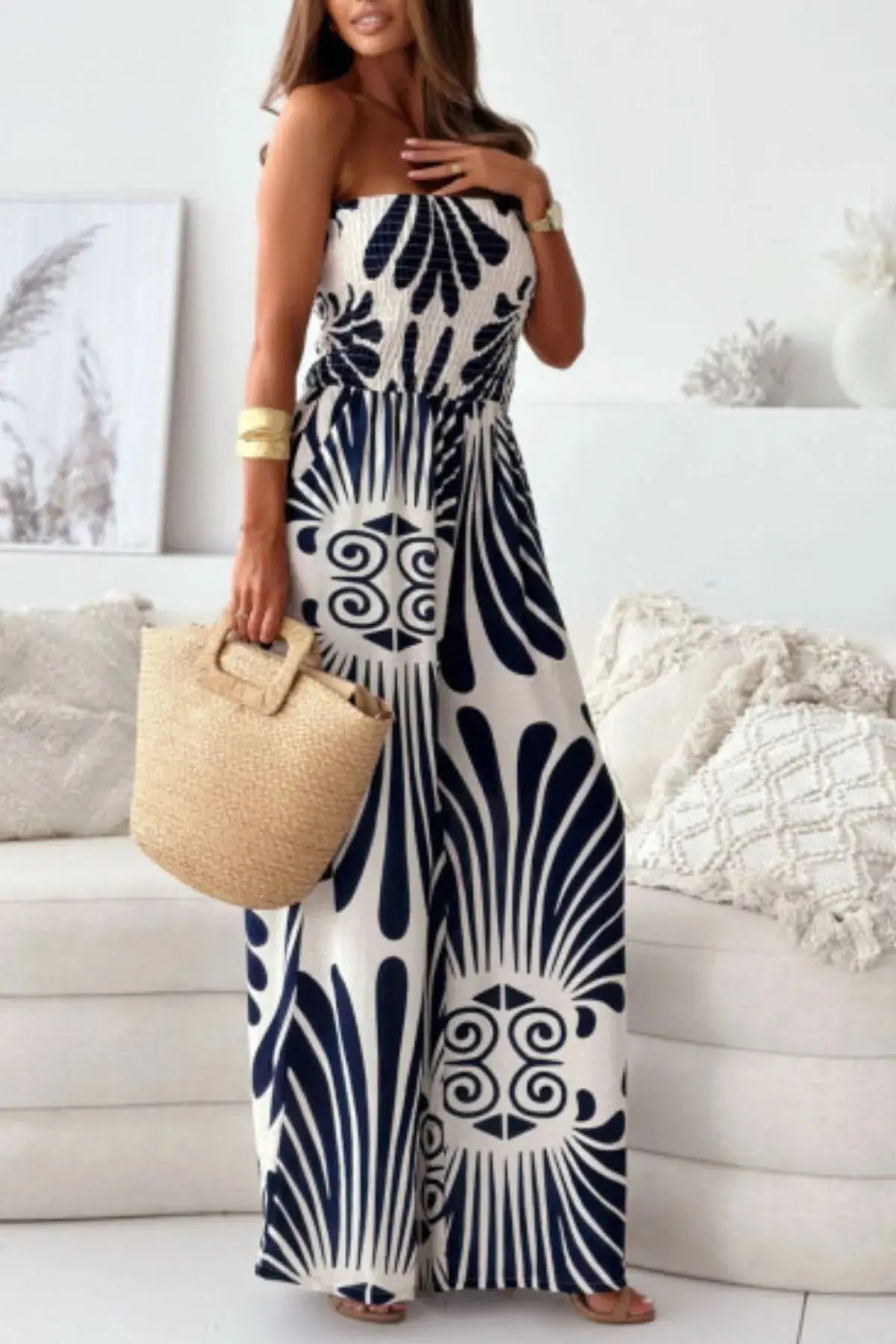 Crafted from 100% wrinkle-resistant polyester, this jumpsuit is machine washable and ready to roll. Functional pockets add practicality without compromising the clean lines of the design, while top lengths between 47.2" and 48.8" across sizes S to 2XL suit a variety of frames with ease. Bust measurements ranging from 34.6" to 43.3" ensure it hugs where it counts, without feeling restrictive.