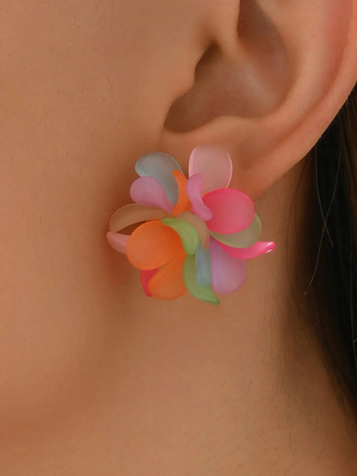 Lightweight and corrosion-resistant when properly cared for, they are imported for quality and comfort. The push-back closure provides a secure fit, ideal for all-day wear across seasons. Designed as a single-pair style, they're easy to match with denim jackets, resort sets, or minimalist tops for a flash of florals. Sweat should be avoided to preserve the finish—just a simple wipe keeps the glow going.