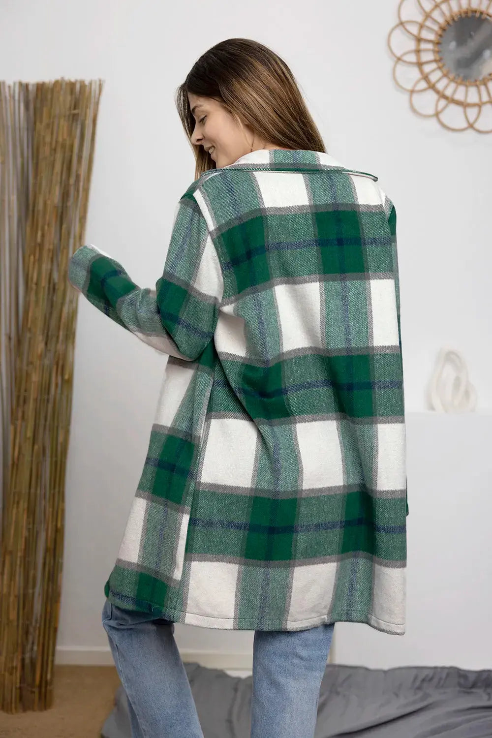 Wrap yourself in cozy charm with this Pink Plaid Button-Up Coat—a statement layer that blends warmth with playful sophistication. Designed in a soft checkered weave of blush, ivory, and brown, this midweight coat features a relaxed fit that’s perfect for layering over your everyday essentials. Classic button-front detailing and side pockets offer practicality, while the longline silhouette adds a modern, polished finish. Whether you're strolling downtown or escaping to a weekend cabin, this piece brings tex