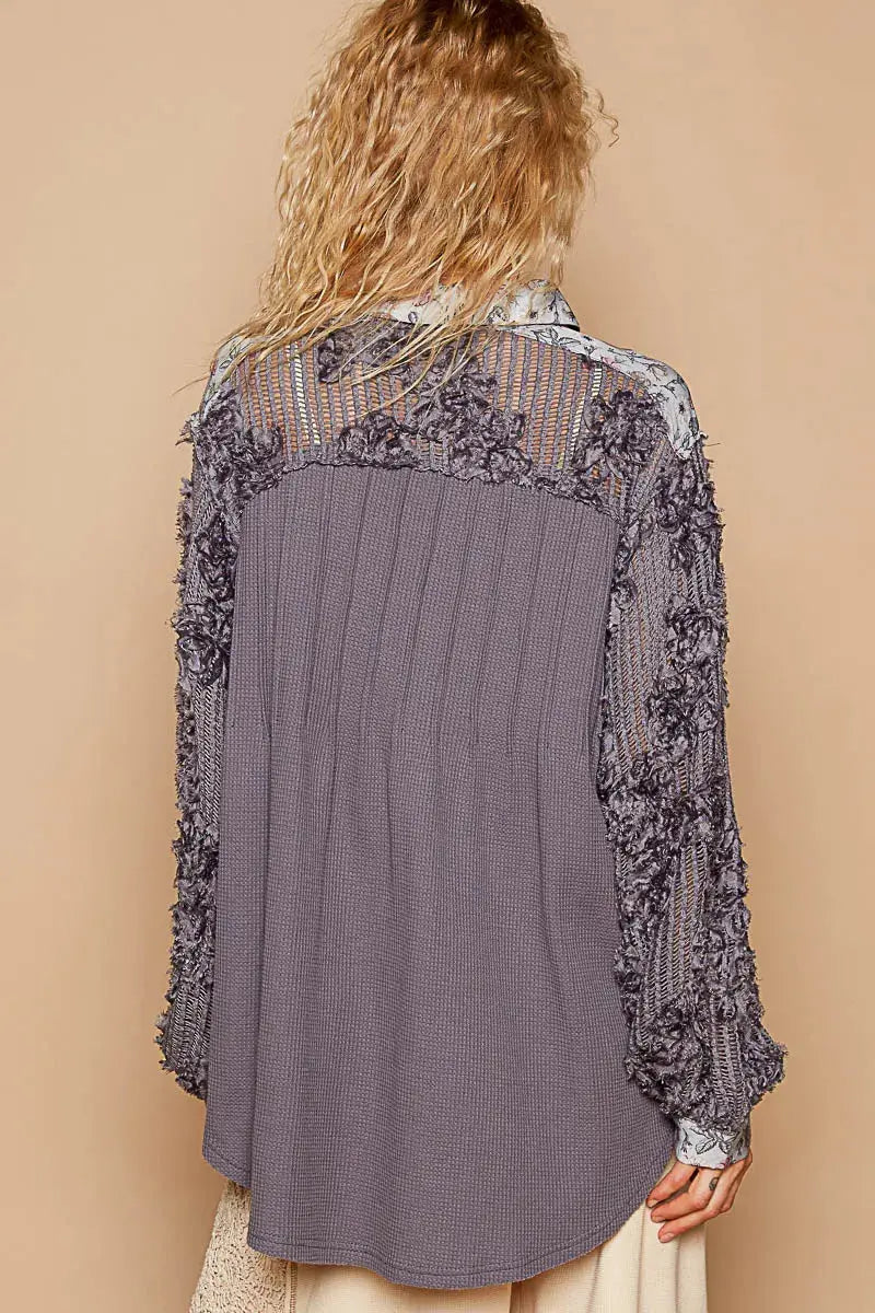 This beautiful blouse features a floral print and delicate lace detailing for a feminine touch. The half-button design adds a stylish and versatile element to the top. With long sleeves, this blouse is perfect for adding a touch of elegance to your outfit while keeping you warm. Elevate your wardrobe with this chic and romantic piece.