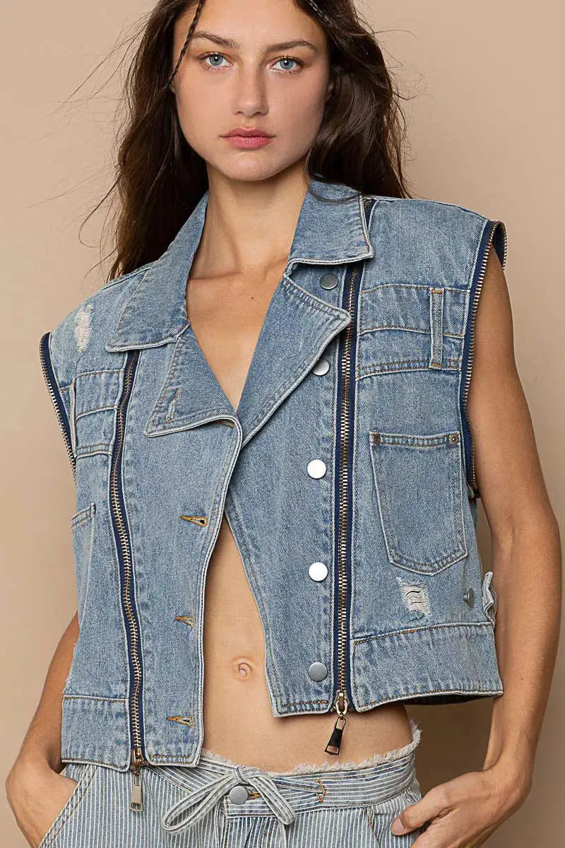 This fashion oversized cropped denim jacket features a vintage-inspired design with premium cotton denim construction. The jacket showcases a relaxed fit with dropped shoulders and a cropped hemline that pairs perfectly with high-waisted bottoms. Multiple zipper accents add edgy detail while the classic blue wash provides versatile styling options. The structured collar and lapels create a sophisticated silhouette, making it ideal for layering over casual outfits or dressing up everyday looks.