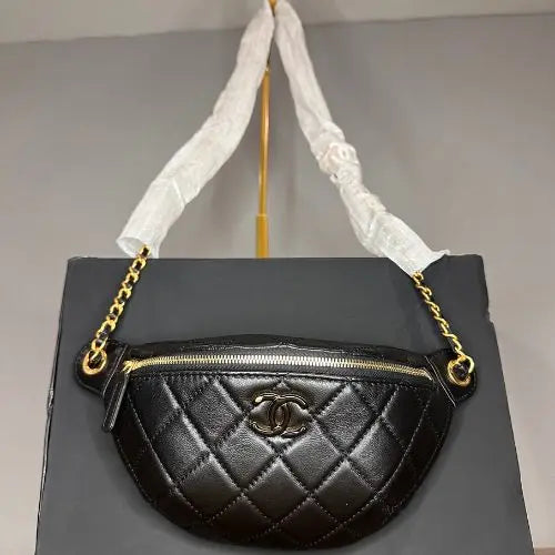 Crafted from premium materials, it offers a spacious interior, a secure magnetic closure, and an adjustable top handle, allowing for versatile carrying options—whether as a handbag or shoulder bag. Perfect for both day and evening wear, this piece blends Parisian-inspired elegance with modern functionality, making it a must-have accessory for any wardrobe.
