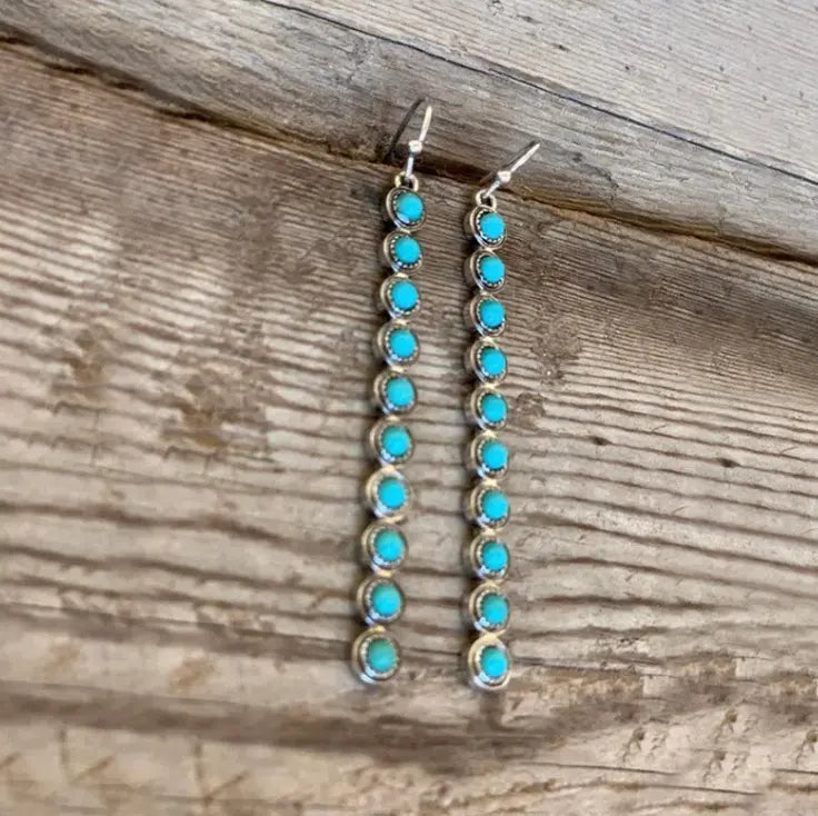 Southwestern turquoise drop earrings with antique silver detailing — modern boho accessories by Atlas by J&D.