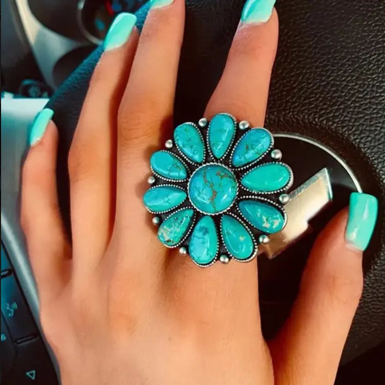 Up Close of the Colorado Western Turquoise Ring on a model's hand