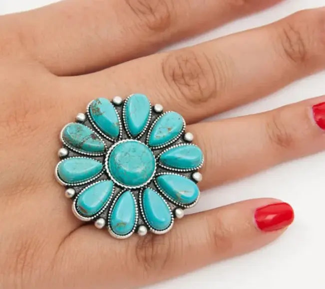 Up Close of the Colorado Western Turquoise Ring on a model's hand