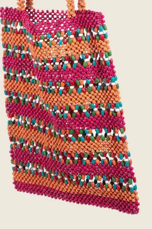 Side Picture of Eco Sustainable Handcrafted Bag made with bright wooden pieces. A colorful masterpiece.