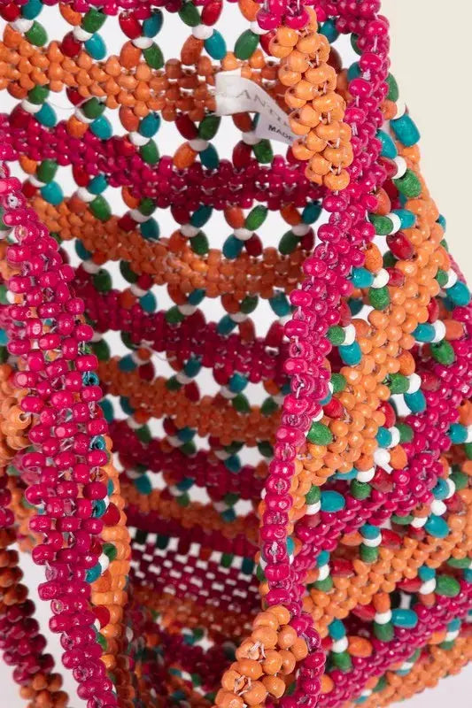 Inside Close-up Picture of Eco Sustainable Handcrafted Bag made with bright wooden pieces. A colorful masterpiece.