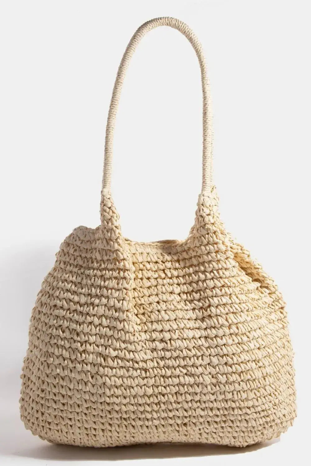 Woven straw handbag on a white background
