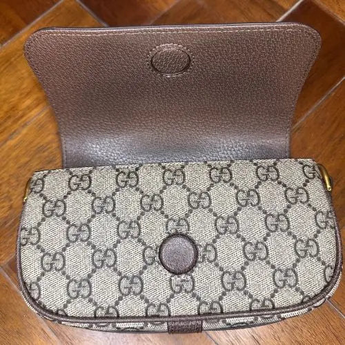 Elevate your accessory collection with this sophisticated designer-inspired crossbody bag. Featuring an elegant monogram print that exudes timeless style, this high-quality bag combines functionality with fashion-forward design. Perfect for everyday wear, it offers convenient hands-free carrying while making a refined statement.