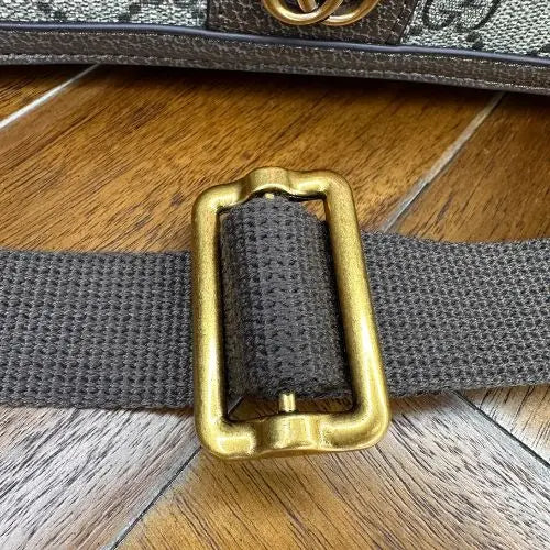 Elevate your accessory collection with this sophisticated designer-inspired crossbody bag. Featuring an elegant monogram print that exudes timeless style, this high-quality bag combines functionality with fashion-forward design. Perfect for everyday wear, it offers convenient hands-free carrying while making a refined statement.