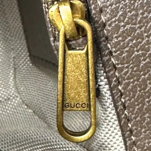 Elevate your accessory collection with this sophisticated designer-inspired crossbody bag. Featuring an elegant monogram print that exudes timeless style, this high-quality bag combines functionality with fashion-forward design. Perfect for everyday wear, it offers convenient hands-free carrying while making a refined statement.