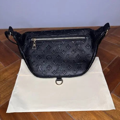 This classic designer-style crossbody bum bag combines timeless elegance with practical functionality. Crafted for those who appreciate refined fashion, it offers a sleek silhouette and adjustable strap for comfortable, hands-free wear. Ideal for carrying essentials securely while maintaining a sophisticated look, this bag is perfect for everyday use or stylish outings.