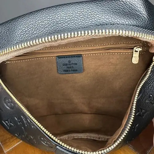 This classic designer-style crossbody bum bag combines timeless elegance with practical functionality. Crafted for those who appreciate refined fashion, it offers a sleek silhouette and adjustable strap for comfortable, hands-free wear. Ideal for carrying essentials securely while maintaining a sophisticated look, this bag is perfect for everyday use or stylish outings.