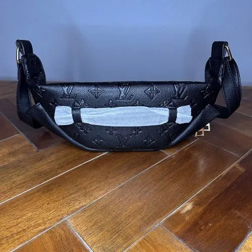 This classic designer-style crossbody bum bag combines timeless elegance with practical functionality. Crafted for those who appreciate refined fashion, it offers a sleek silhouette and adjustable strap for comfortable, hands-free wear. Ideal for carrying essentials securely while maintaining a sophisticated look, this bag is perfect for everyday use or stylish outings.