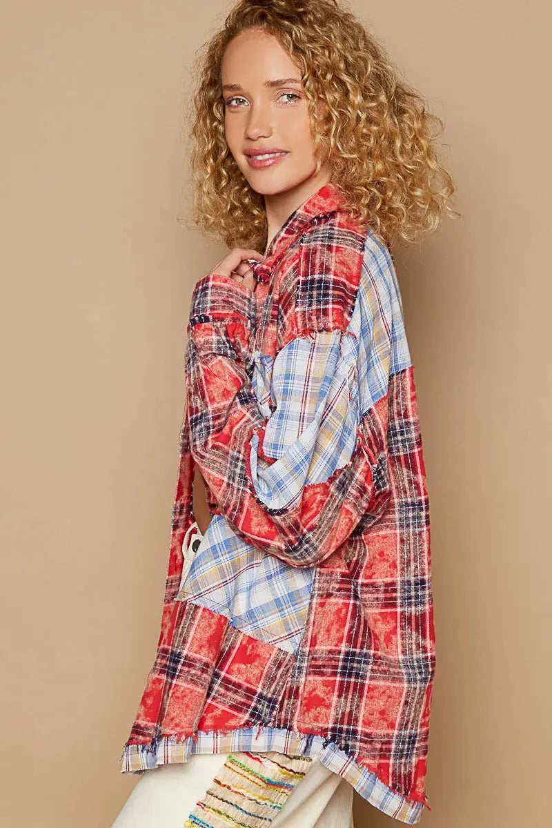 This long sleeve shirt showcases a stylish plaid patchwork design with raw edge detailing for a trendy and edgy look. The combination of prints adds visual interest and dimension to the shirt. Perfect for adding a touch of casual-cool to your outfit, this shirt is a statement piece. Stay on-trend with this unique and versatile addition to your wardrobe.