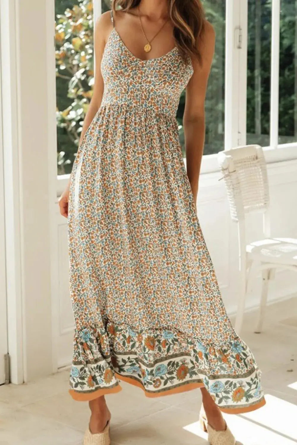 Made from 95% polyester and 5% elastane, it offers wrinkle resistance and breathable comfort. Though unlined, the fabric remains opaque, delivering style with assurance. Available in sizes S to L, the tailored fit—from bust to hem—flatters a range of shapes while keeping things light and airy. Adjustable straps and a cami neckline lend effortless versatility, making it a must-pack for travel and weekend wanderlust alike.
