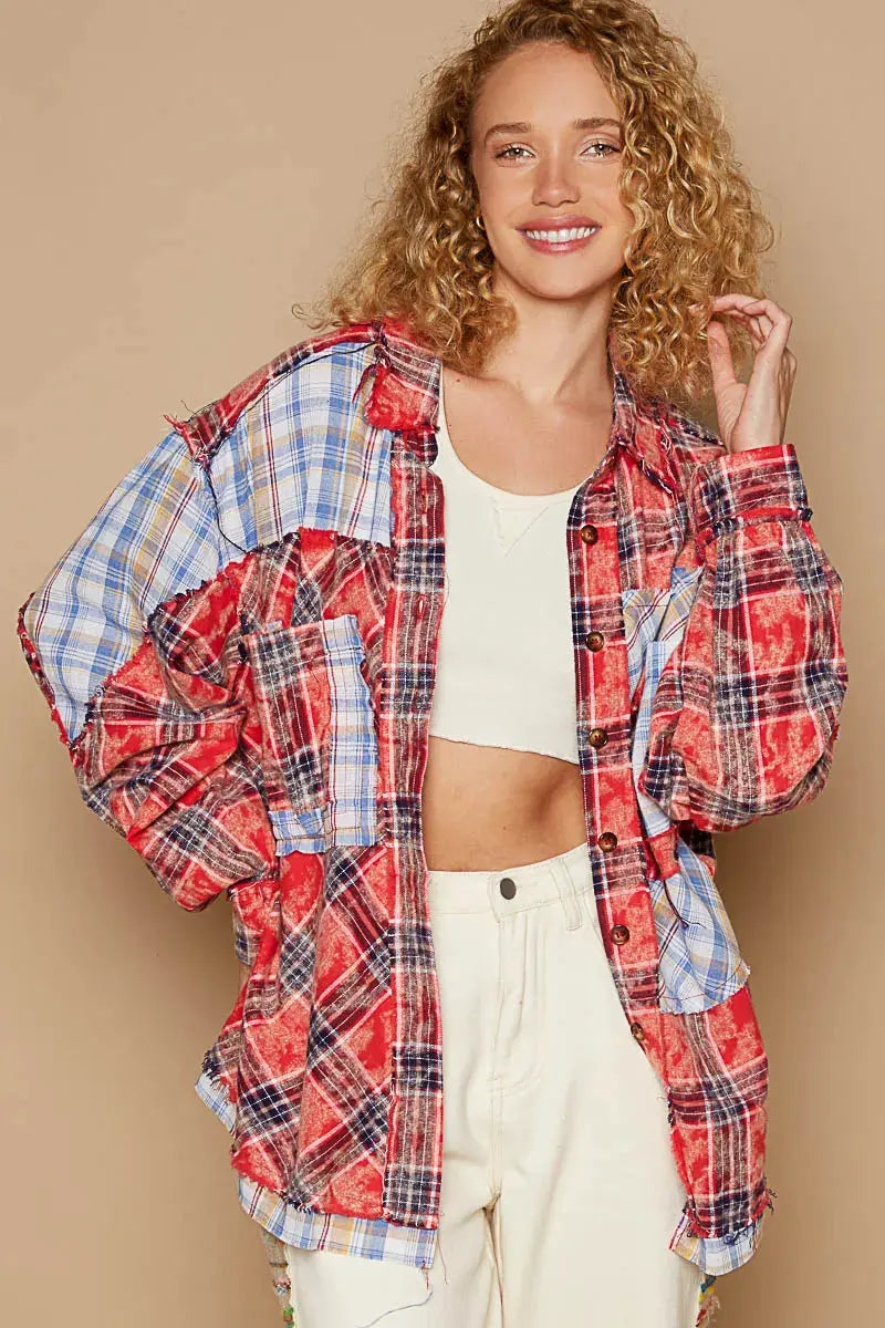 This long sleeve shirt showcases a stylish plaid patchwork design with raw edge detailing for a trendy and edgy look. The combination of prints adds visual interest and dimension to the shirt. Perfect for adding a touch of casual-cool to your outfit, this shirt is a statement piece. Stay on-trend with this unique and versatile addition to your wardrobe.