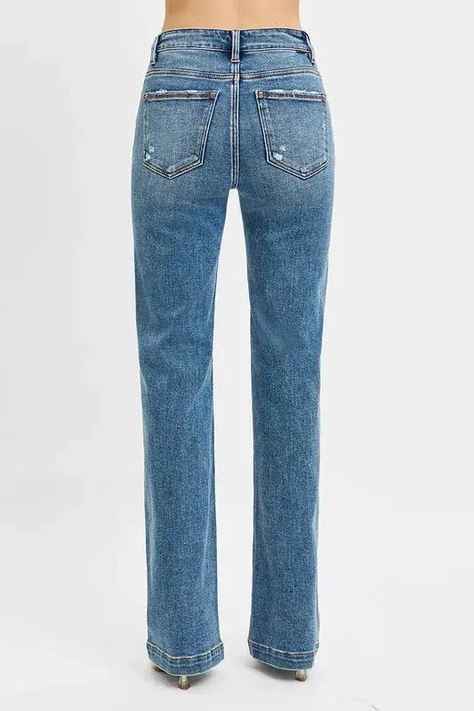 These classic blue flare leg jeans feature a high-waisted design that creates a flattering silhouette while offering a fashion retro-inspired look. Made from premium stretch denim fabric, they provide all-day comfort with a perfect fit through the hips and thighs before flaring out at the knee. The medium blue wash with subtle fading gives them a versatile appeal suitable for both casual and semi-dressy occasions.