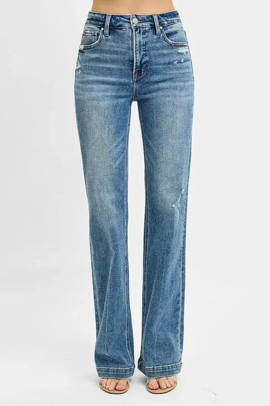 These classic blue flare leg jeans feature a high-waisted design that creates a flattering silhouette while offering a fashion retro-inspired look. Made from premium stretch denim fabric, they provide all-day comfort with a perfect fit through the hips and thighs before flaring out at the knee. The medium blue wash with subtle fading gives them a versatile appeal suitable for both casual and semi-dressy occasions.