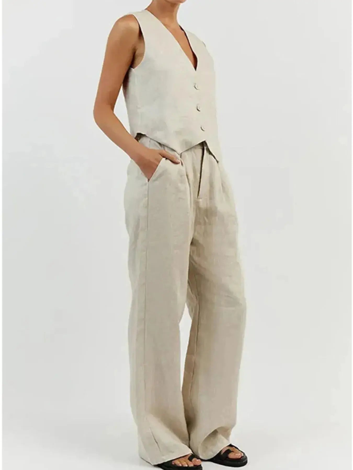 Functional pockets enhance convenience while lending the outfit a utilitarian charm. The top features a modest crop that pairs effortlessly with high-waisted bottoms, while the straight-leg pants offer ease through the hips and thighs. Available in sizes XS to 3XL, the set includes detailed measurements—waist starting at 23.2", bust from 32.3", and full bottom length up to 41.3"—to ensure a personalized fit.