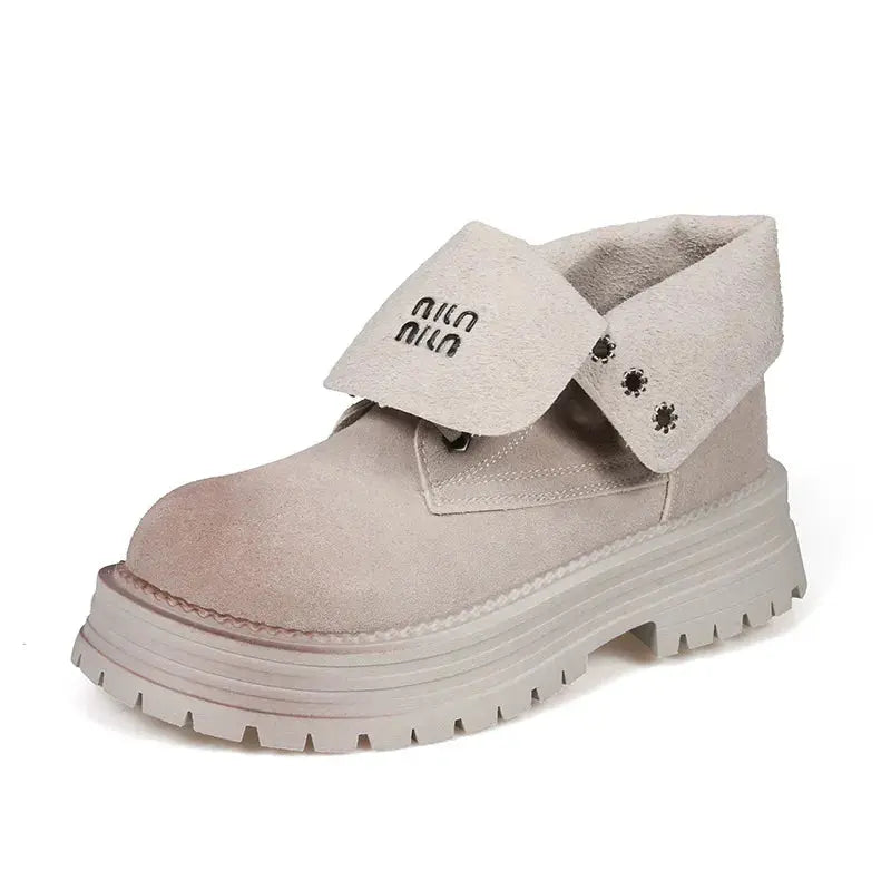 Round Toe meets urban edge in these Crump Street lace-up platform boots, crafted for those who never compromise on comfort or cool. With a mid-heel design and sturdy rubber outsole, you’ll walk confidently through every season. The vegan suede upper offers a luxe touch, making these boots equally suited for casual streetwear or bold layering moments.