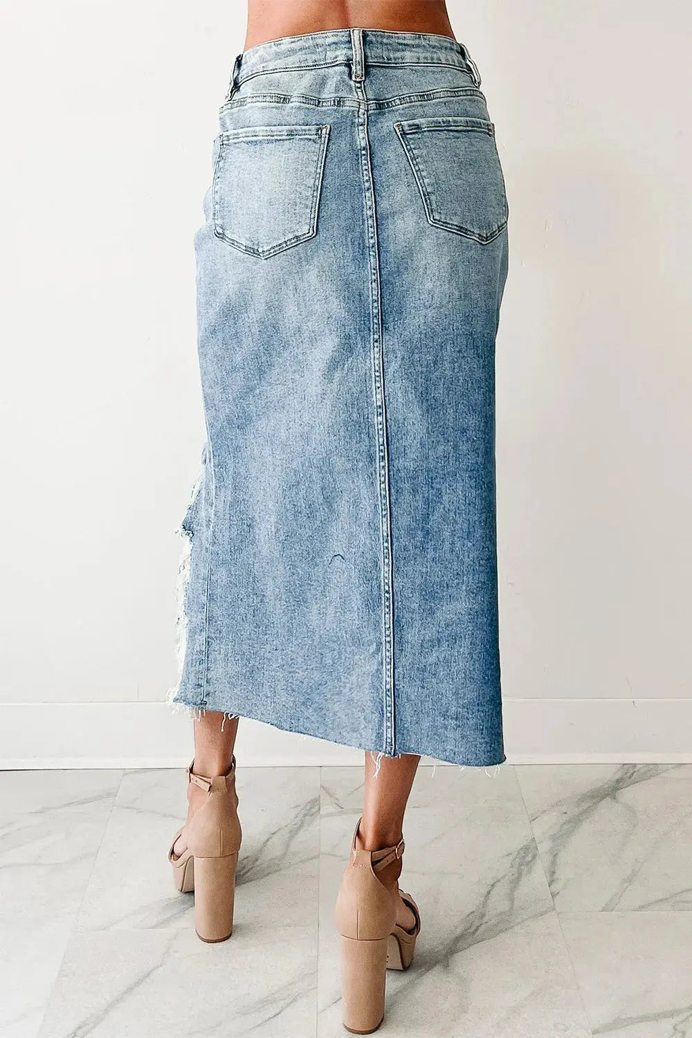 e9e889cf-Made from a blend of 93% cotton, 5% polyester, and 2% elastane, it holds its shape without stretch, ensuring structure and a tailored feel. Product measurements across S–XL range from a 26.4" to 34.3" waist, and 35.4" to 43.3" hips, giving it broad versatility. The button closure, traditional pockets, and asymmetrical cut give it a lived-in aesthetic with elevated attitude.-40b2-ad15-93b6cbca38b3-Max-Origin