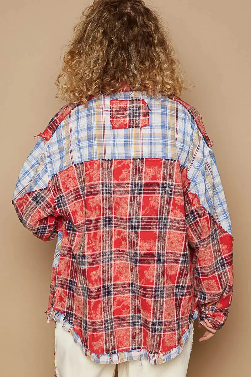 This long sleeve shirt showcases a stylish plaid patchwork design with raw edge detailing for a trendy and edgy look. The combination of prints adds visual interest and dimension to the shirt. Perfect for adding a touch of casual-cool to your outfit, this shirt is a statement piece. Stay on-trend with this unique and versatile addition to your wardrobe.