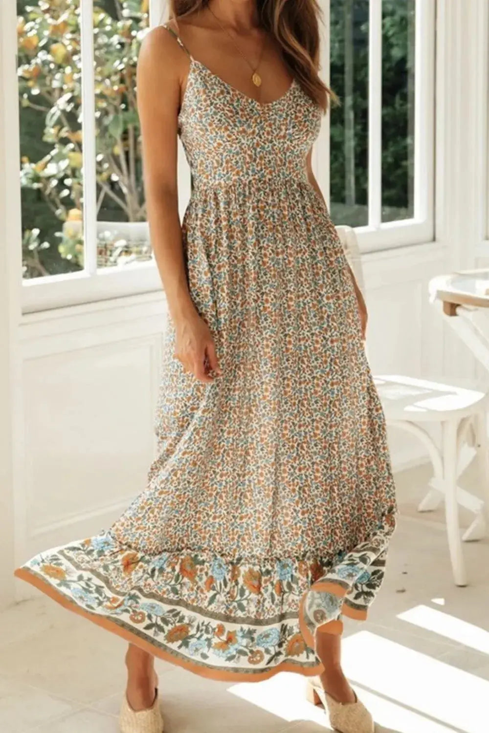 Made from 95% polyester and 5% elastane, it offers wrinkle resistance and breathable comfort. Though unlined, the fabric remains opaque, delivering style with assurance. Available in sizes S to L, the tailored fit—from bust to hem—flatters a range of shapes while keeping things light and airy. Adjustable straps and a cami neckline lend effortless versatility, making it a must-pack for travel and weekend wanderlust alike.