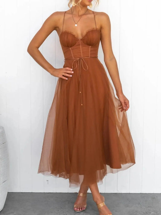 Crafted from 100% polyester, this dress promises lightweight breathability and wrinkle resistance. Available in versatile shades—black, brown, and pink—it’s offered in sizes S to XL with a flattering range of bust and waist measurements to suit every silhouette. The full-length design adds drama, while the soft stretch keeps movement unrestricted.