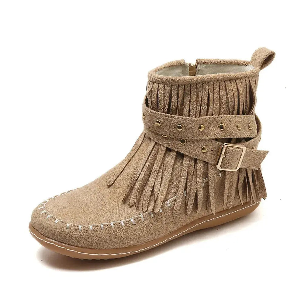 Earthy Tones set the tone for effortless style in these studded fringe suede flat boots by Grace Step. Designed to feel like a second skin, the vegan suede contours gently to your foot, creating a balanced mix of grounded elegance and playful charm. Whether dressing up denim or offsetting a neutral maxi dress, this boot adds instant personality to any look.