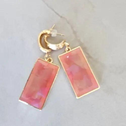 Gold hoop earrings with rectangular dark pink resin pendants — Atlas by J&D women’s boutique jewelry.
