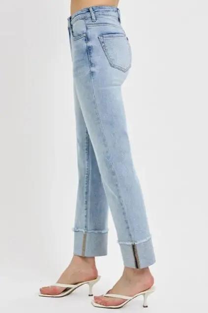 Side profile of Risen light wash cuffed jeans showing clean seams and relaxed silhouette — modern boutique denim.