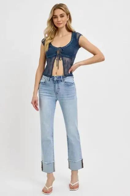 Model wearing light wash Risen high rise cuffed jeans with denim crop top and heels — elevated everyday denim by Atlas by J&D.