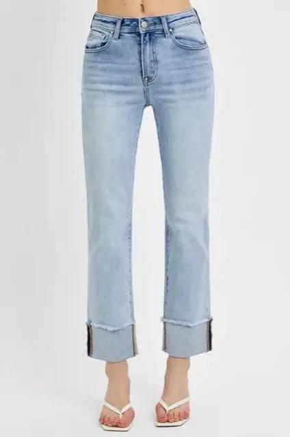 Front view of light wash high rise straight jeans with wide cuff hem — Risen relaxed fit denim from Atlas by J&D