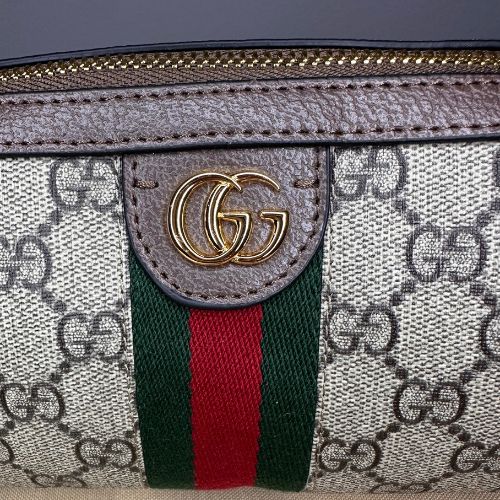 Designer-inspired round crossbody bag with structured silhouette and refined detail, hand-selected and curated by Atlas by J&D