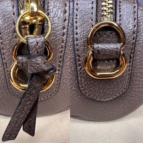 Designer-inspired round crossbody bag with structured silhouette and refined detail, hand-selected and curated by Atlas by J&D