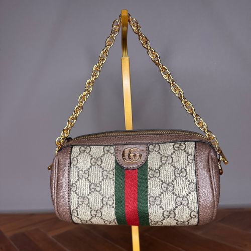 Designer-inspired round crossbody bag with structured silhouette and refined detail, hand-selected and curated by Atlas by J&D