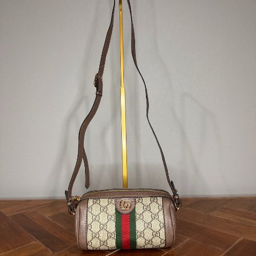 Designer-inspired round crossbody bag with structured silhouette and refined detail, hand-selected and curated by Atlas by J&D