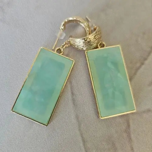 Rectangular soft green resin earrings with gold hoop base and marbled finish — elevated statement jewelry from Atlas by J&D.