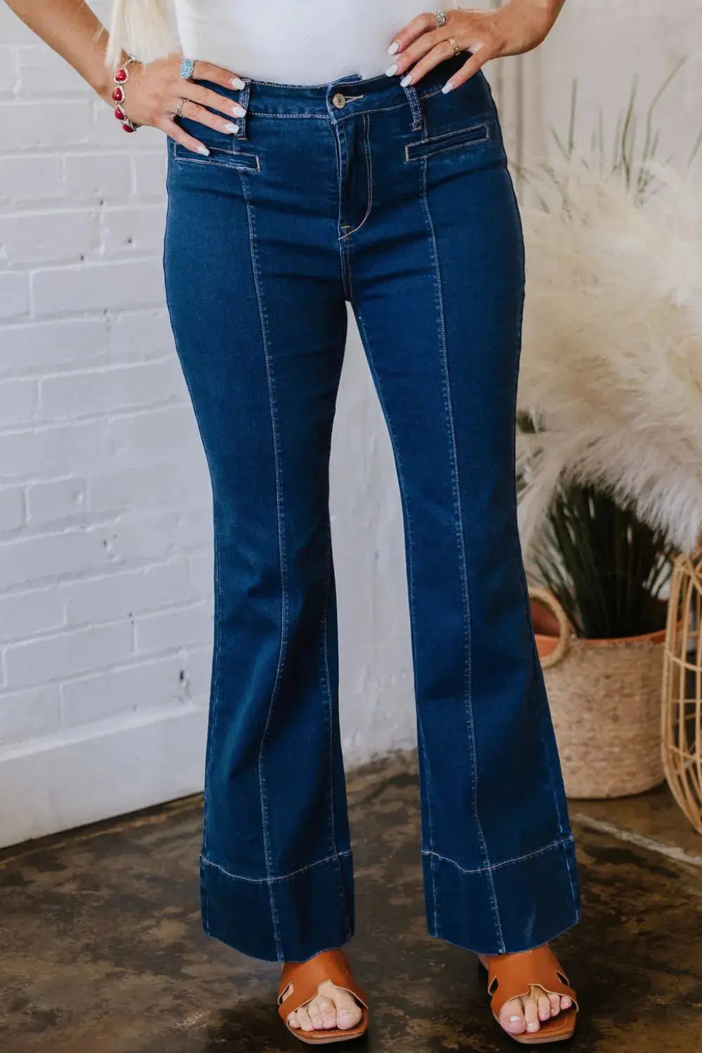 Elevate your denim collection with these Deep Wash Straight Jeans, designed for effortless sophistication and everyday wear. The rich deep wash adds a polished touch, making these jeans a staple for both casual and refined looks. Crafted from a blend of 65% cotton, 33% polyester, and 2% elastane, they offer durability and structure while maintaining a comfortable fit.