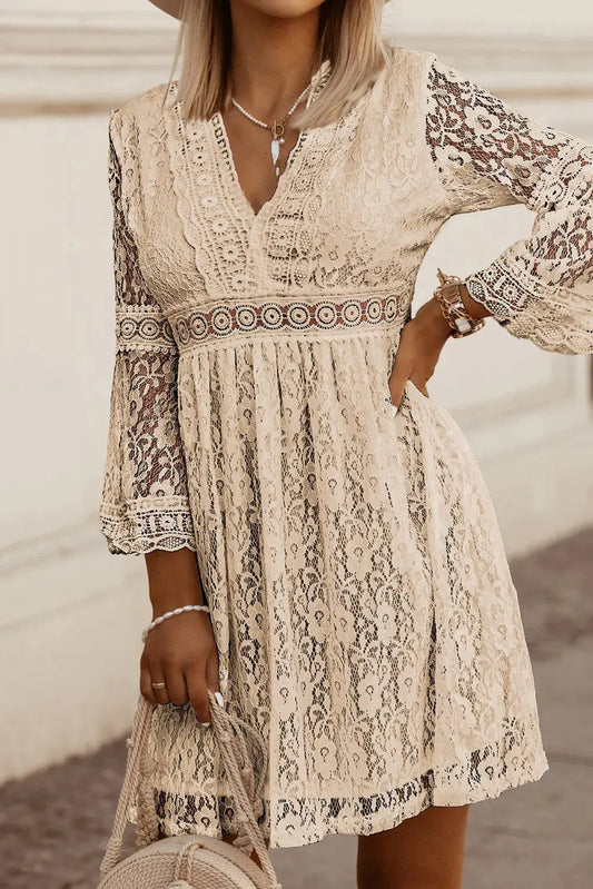 Romantic and refined, the Lace V-Neck Three-Quarter Sleeve Dress brings timeless elegance to your wardrobe. Crafted in delicate lace with a flattering V-neckline, it features three-quarter sleeves and a softly structured silhouette that skims the body. The opaque finish and unlined design offer lightweight comfort, perfect for layering or wearing solo.