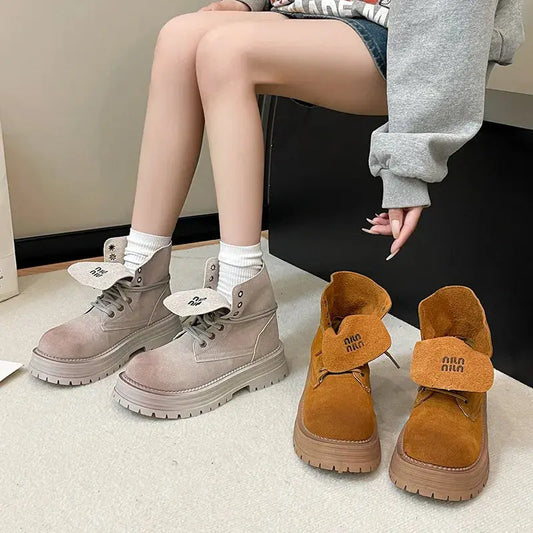 Round Toe meets urban edge in these Crump Street lace-up platform boots, crafted for those who never compromise on comfort or cool. With a mid-heel design and sturdy rubber outsole, you’ll walk confidently through every season. The vegan suede upper offers a luxe touch, making these boots equally suited for casual streetwear or bold layering moments.