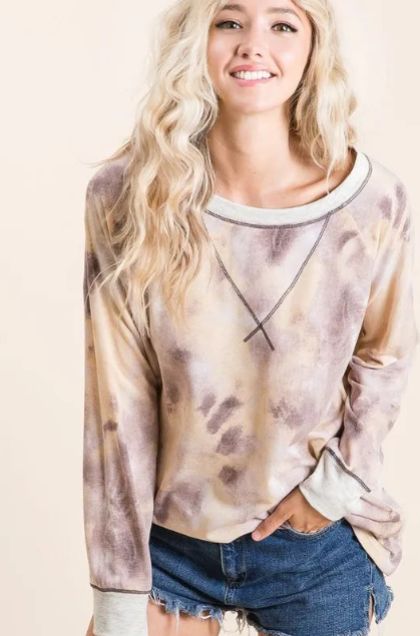 Tie dye long sleeve top in muted neutral colors with contrast stitching at the neckline and hem for an elevated casual style.