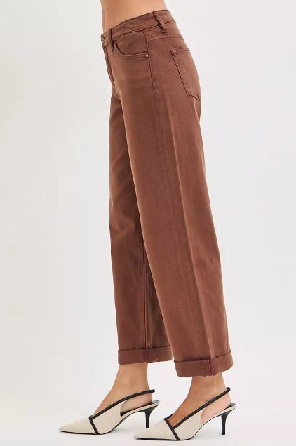 Side view of Risen high rise straight jeans in cocoa brown featuring a relaxed drape and cuffed hem.