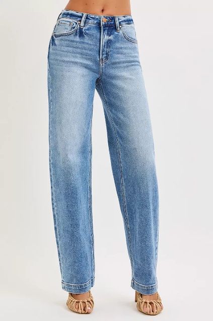 High rise Risen relaxed barrel jeans in a soft light wash with a subtly rounded leg shape.