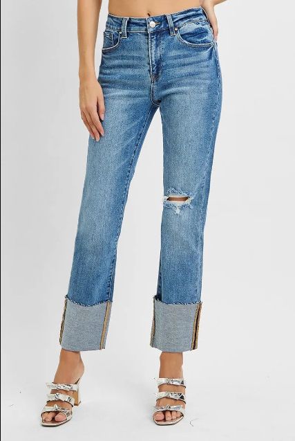 Risen high rise straight jeans shown in a full-body view with a wide cuff and soft vintage wash.